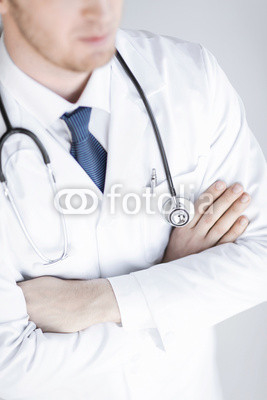 doctor with stethoscope in white uniform