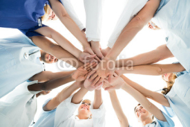 Multiethnic Medical Team Stacking Hands