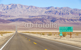 Death Valley landscape and road sign,California