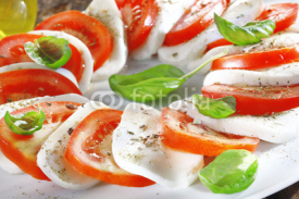 Fototapety Cheese and tomato salad with herbs