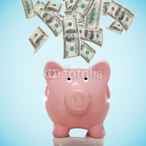 Naklejki Piggy bank with hundred dollar bills