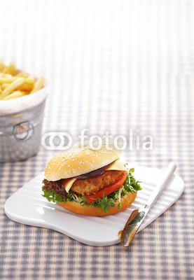 close up chicken burger on white tray