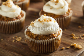 Naklejki Homemade Carrot Cupcakes with Cream Cheese Frosting