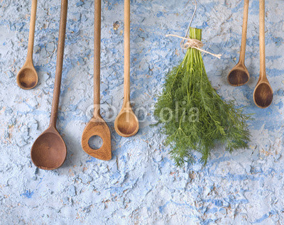 vintage wooden spoons with dill herbs, free copy space