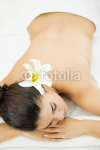 Naklejki Young woman having a massage