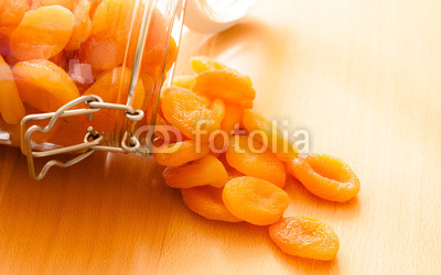 Diet. Glass jar of apricots dried fruits.