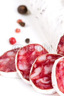 sliced salami isolated on white background