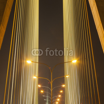 Obrazy i plakaty Light from lamp on the bridge.