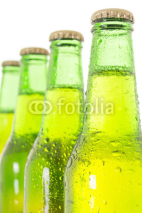 Fototapety Row of beer bottles