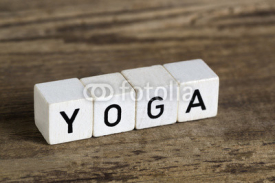Fototapety The word yoga written in cubes