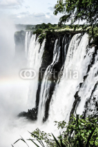 Naklejki Rainbow over Victoria Falls on Zambezi River