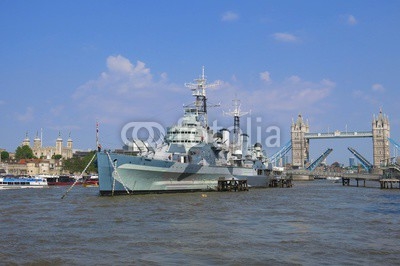 Thames River, London with HMS Belfast, Tower Bridge drawbridge and Tower of London by day