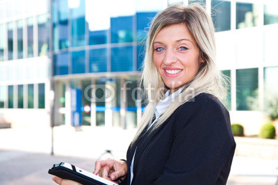 Successful businesswoman with tablet