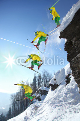 The whole jump of Skier from the rock in mountains