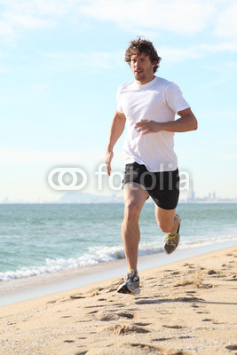 Man running in the beach