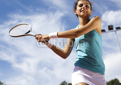 Playing tennis