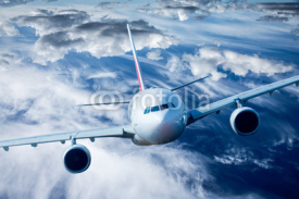 Naklejki Passenger Airliner in the sky