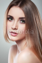 Naklejki Beautiful  girl, isolated on a light-grey background
