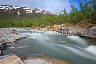 Long exposure of river in the canyon in Abisko National Park.
