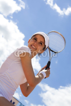 Naklejki Female playing tennis on court 