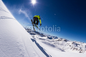 Obrazy i plakaty Alpine skier on piste, skiing downhill