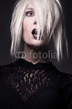 Fototapety Young woman-witch in a vampire look