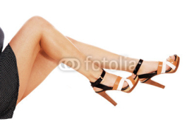Fototapety Legs of young woman.