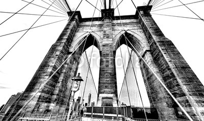 Colorful dramatic HDR image of the front of one of the towers of Brooklyn Bridge in New York City