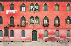 Fototapety Two-storey house with red facade
