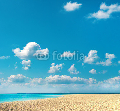 sand beach with blue sky