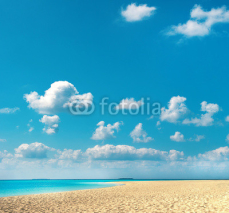 Naklejki sand beach with blue sky