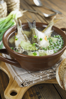 Homemade soup of river fish in the bowl