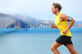 Fototapety Athlete running man - male runner in San Francisco