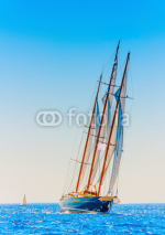 Naklejki Big 3 mast old classic sailing boat in Spetses island in Greece
