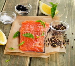 Naklejki Salmon on a wooden board