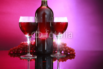 Red wine bottle and a couple of glasses