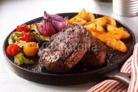 Naklejki Appetizing Beef Steak with Veggies on Skillet