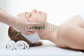 Naklejki Beauty and relaxation concept, attractive woman in spa salon lyi