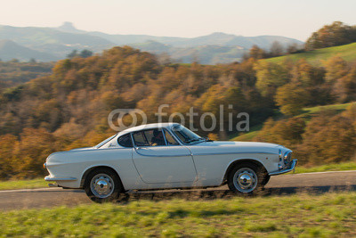 Old car in italian hills