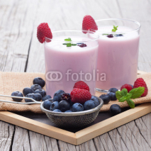Naklejki Milkshake with fresh berries