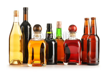 Composition with bottles of assorted alcoholic products isolated