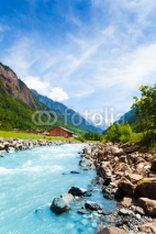 Fototapety Beautiful Swiss landscape with river stream