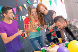 Man blowing out the candles