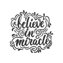 Naklejki Believe in miracle - hand drawn lettering phrase isolated on the white background. Fun brush ink inscription for photo overlays, greeting card or t-shirt print, poster design.