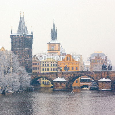 snow Charles bridge in Prague
