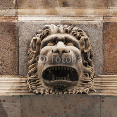 Sculpture of a fierce lion muzzle