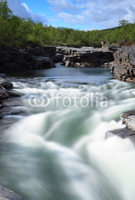 Long exposure of river in the canyon in Abisko