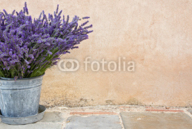 Naklejki Bouquet of lavender in a metal bucket