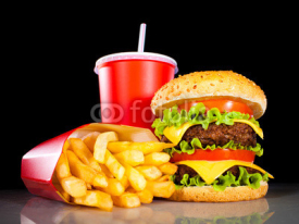 Fototapety Tasty hamburger and french fries on a dark