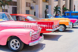 Obrazy i plakaty Colorful american classic car on the street in Havana, Cuba